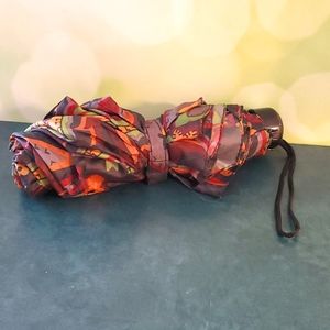 Paisley pattern fall colors folds up compact umbrella